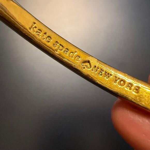 Kate Spade Crystal Bow Gold Tone Hinged Bracelet - Picture 8 of 9